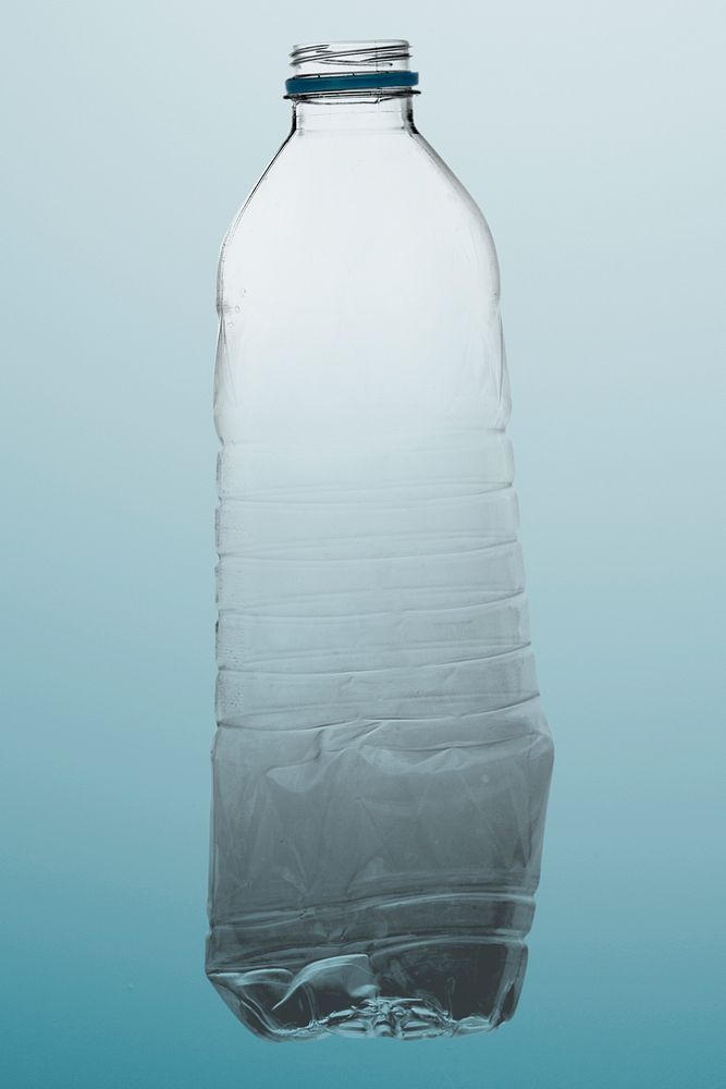Crumpled plastic bottle mockup polluting the environment