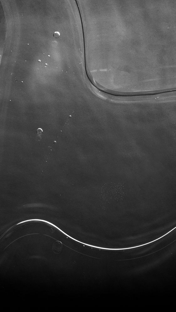 Black water background with bubbles
