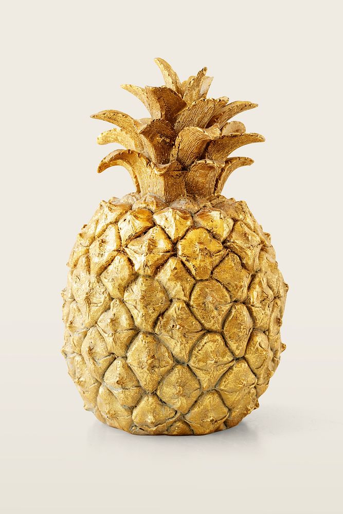 Gold pineapple fruit on off white background