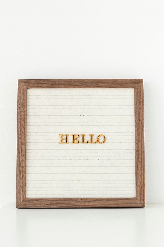 Hello in a wooden square frame design element