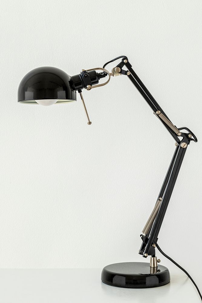 Vintage black desk lamp on a table