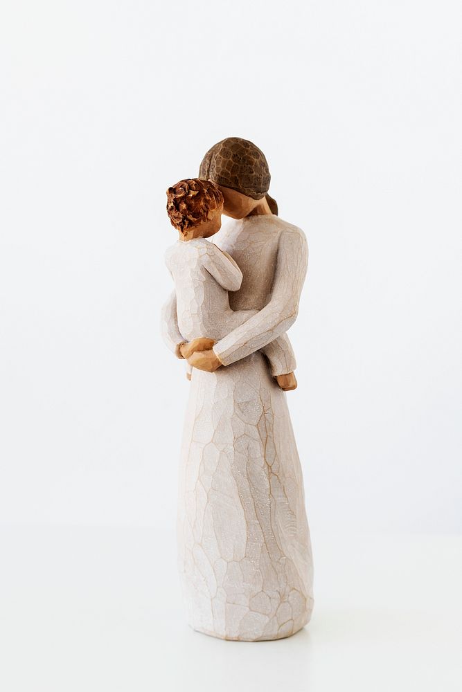 Ornamental tender mother holding her son resin figurine 