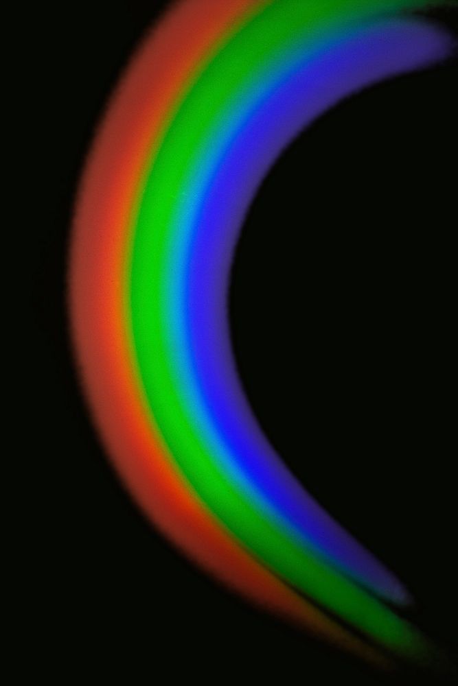 Semicircle light leak effect design element on a black background