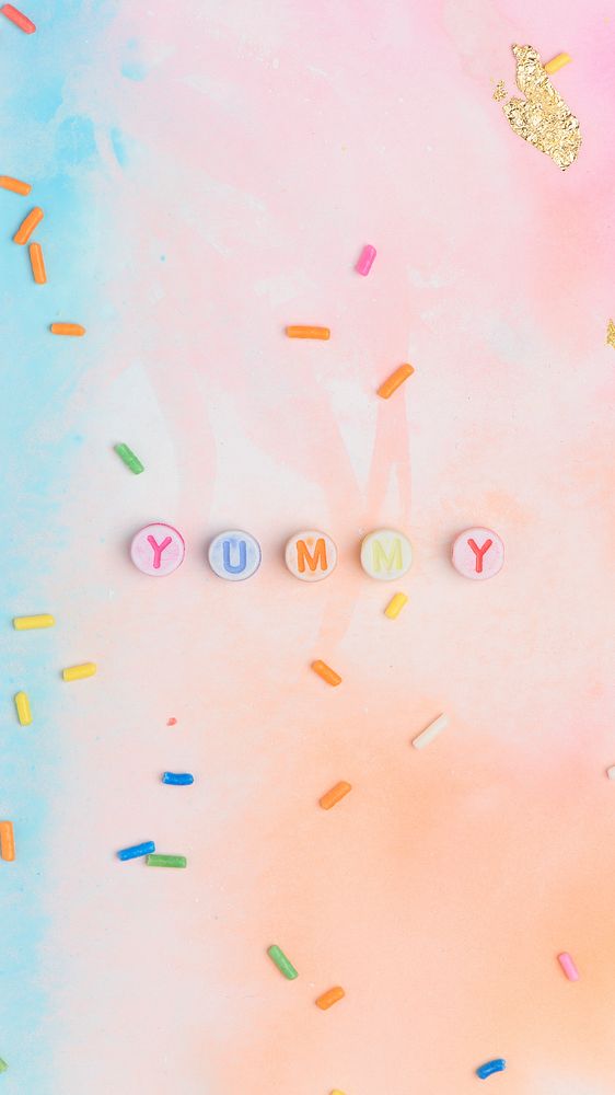 Yummy beads text typography on colorful background