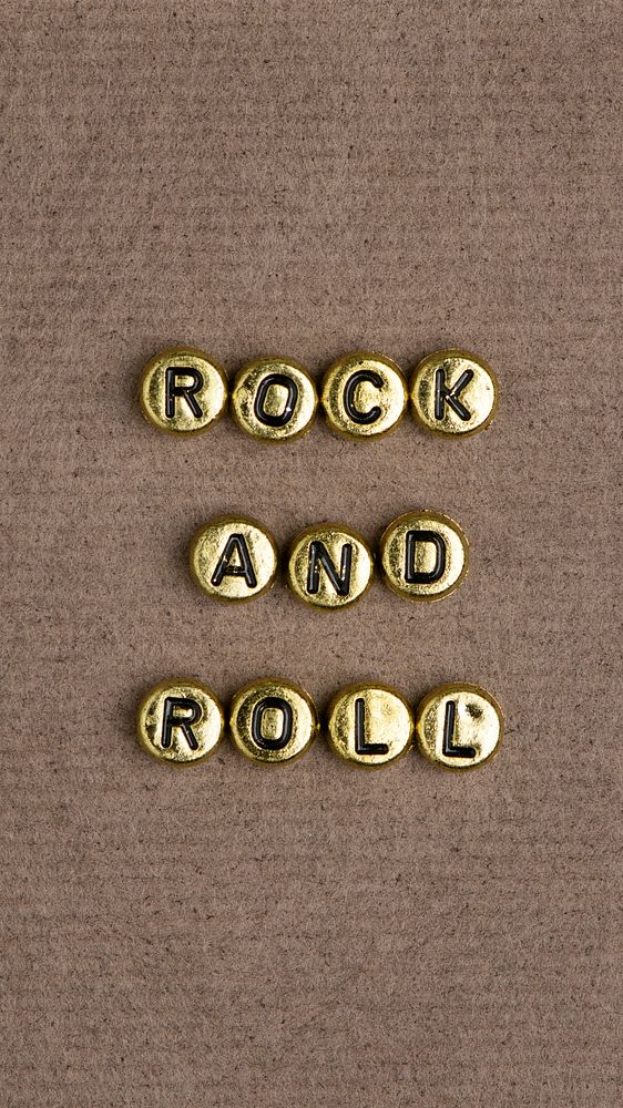 ROCK AND ROLL beads text typography on brown