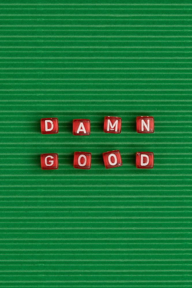 DAMN GOOD beads text typography on green