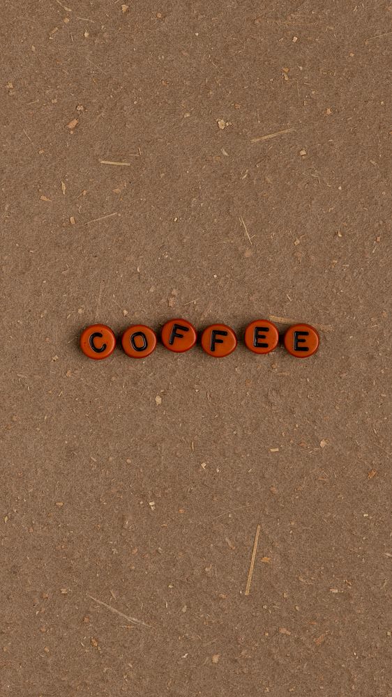 COFFEE beads word typography on brown