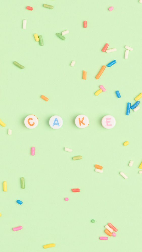 CAKE word beads lettering on green