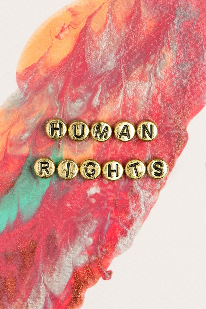 Gold human rights word typography alphabet beads