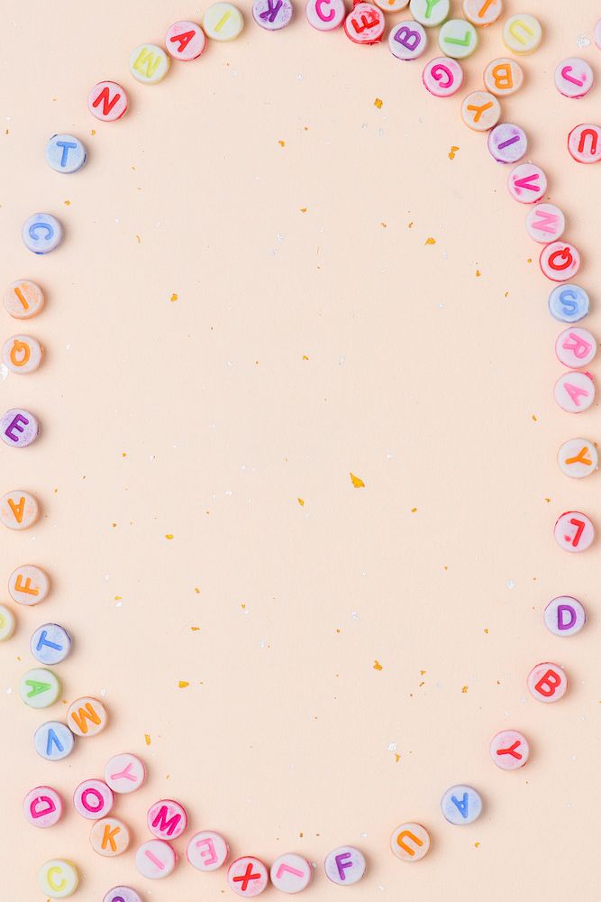 Alphabet beads frame pastel background