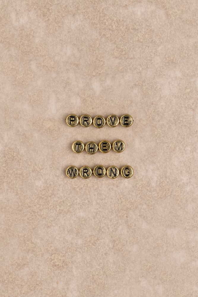 PROVE THEM WRONG beads message typography
