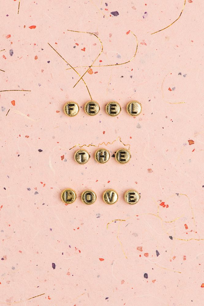 FEEL THE LOVE beads message typography
