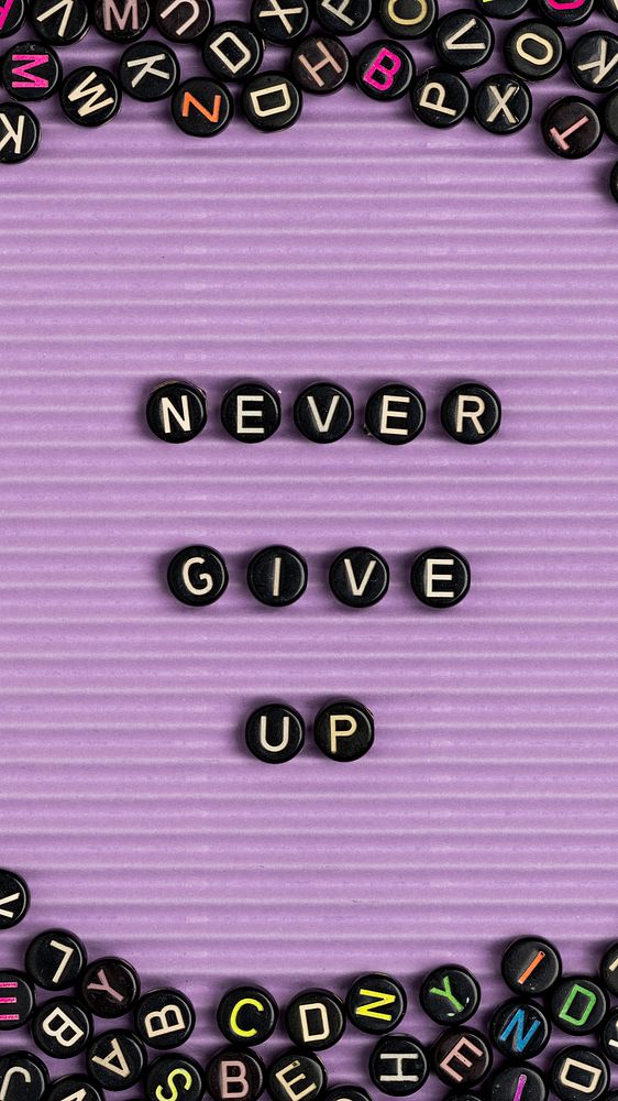 NEVER GIVE UP beads word typography