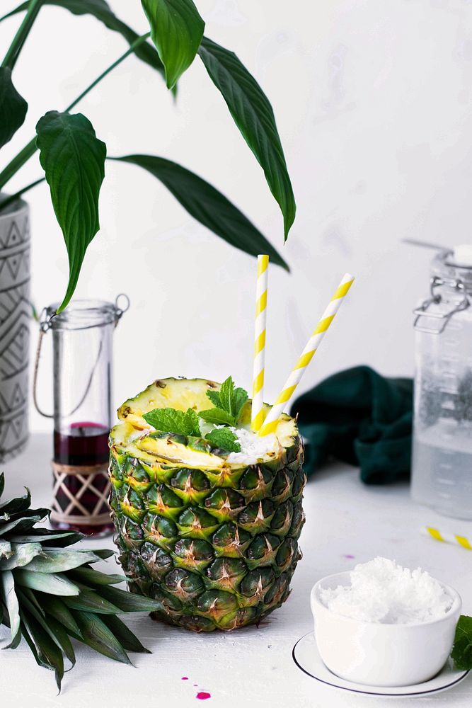 Pineapple healthy drink with coconut cranberry syrup