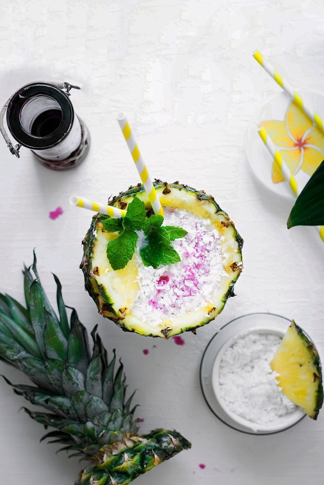 Pineapple drink with coconut cranberry syrup 