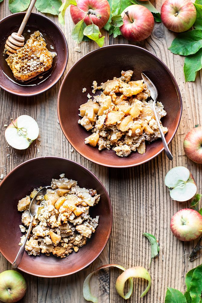 Apple crumble home recipe on wooden table flat lay