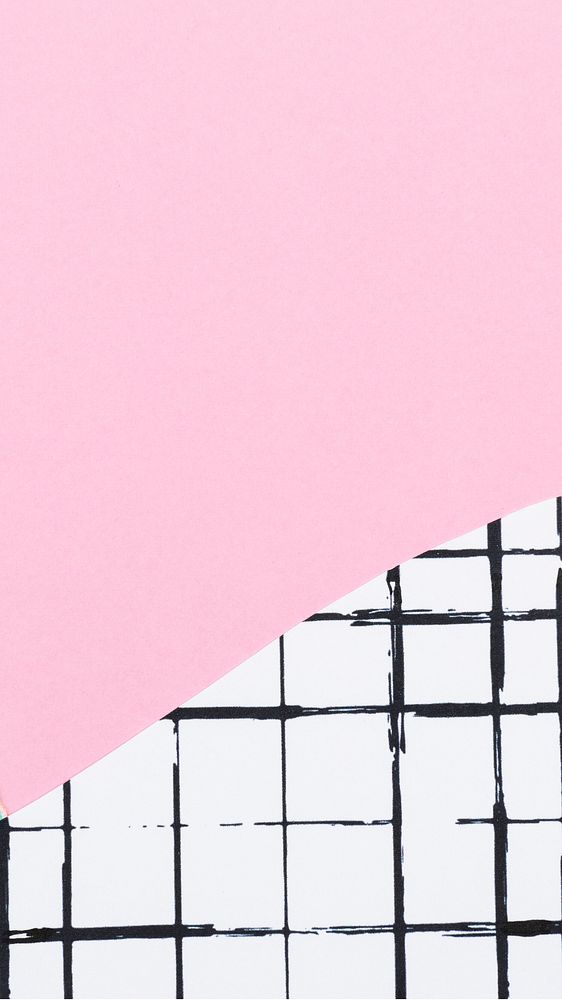Pink ripped paper on grid pattern background 