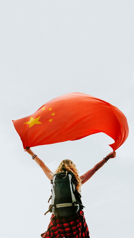 Woman holding the Chinese flag mobile wallpaper