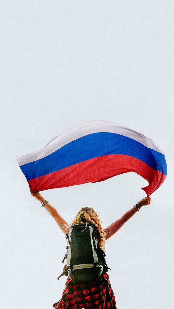 Woman holding the Russian flag mobile wallpaper