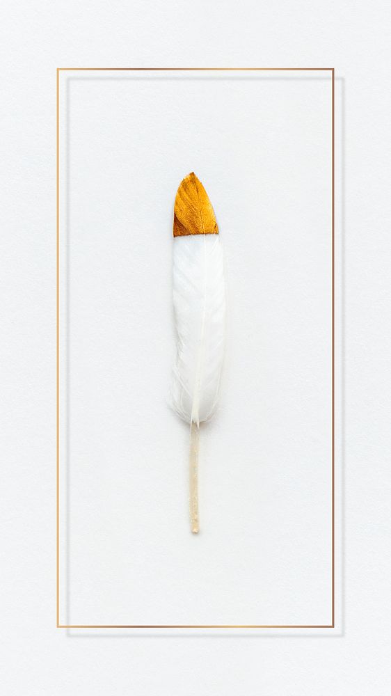 White feather with a copper tip in a gold frame mobile phone wallpaper mockup