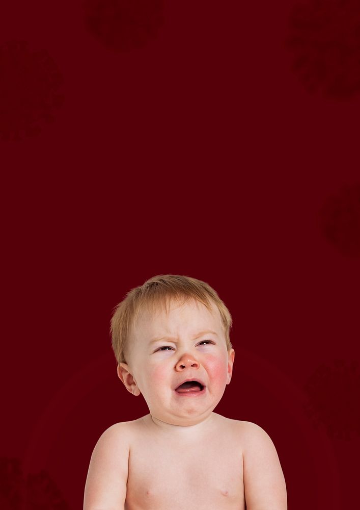 Crying baby in a red background