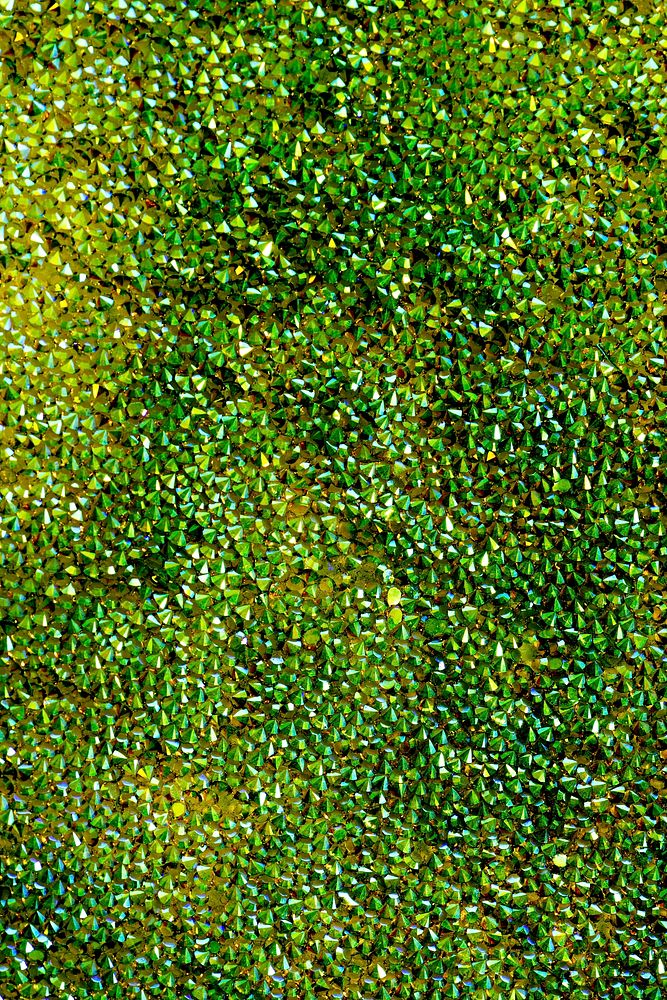 Metallic green spiky stud textured background