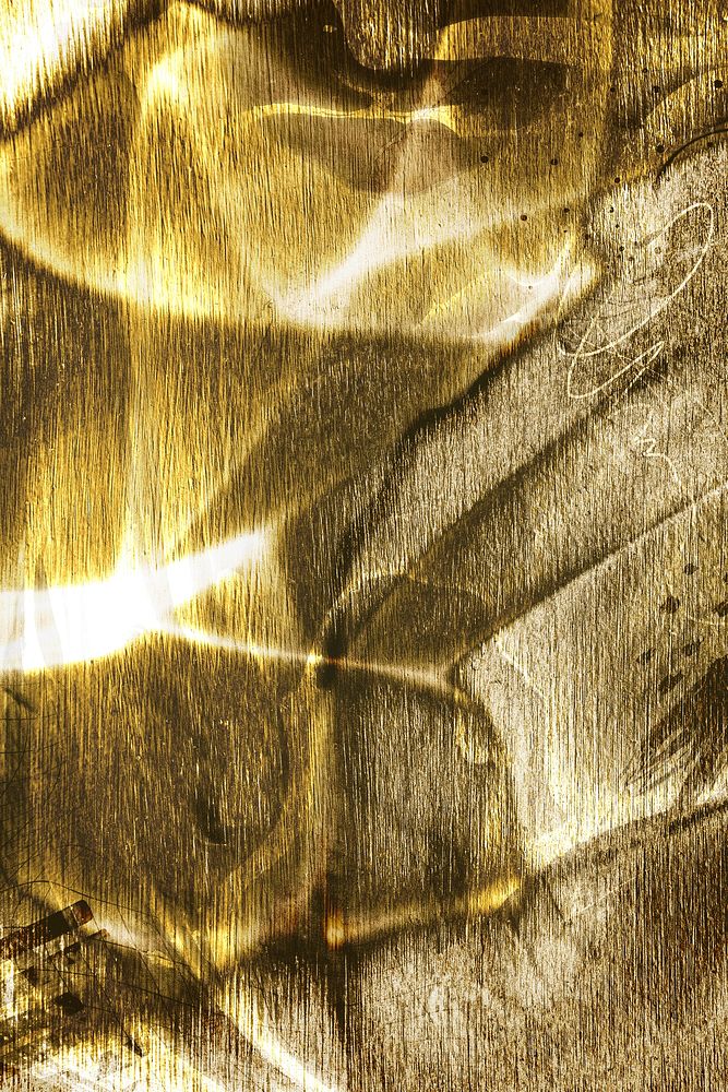 Silky golden fabric textured background