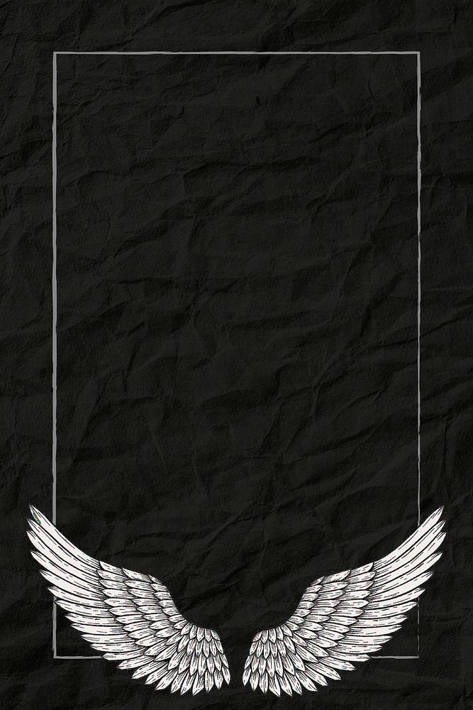 Angel wings frame on a black paper textured background