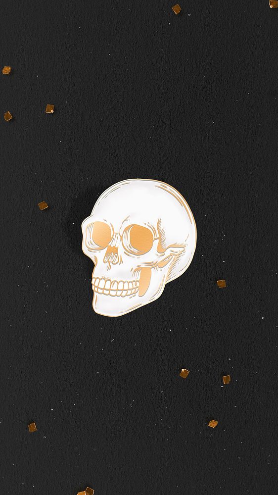 Gold skull on black background
