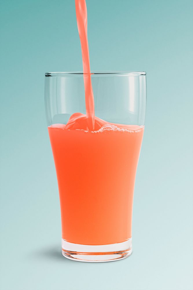 Juicy fruit punch poured into a glass design resource