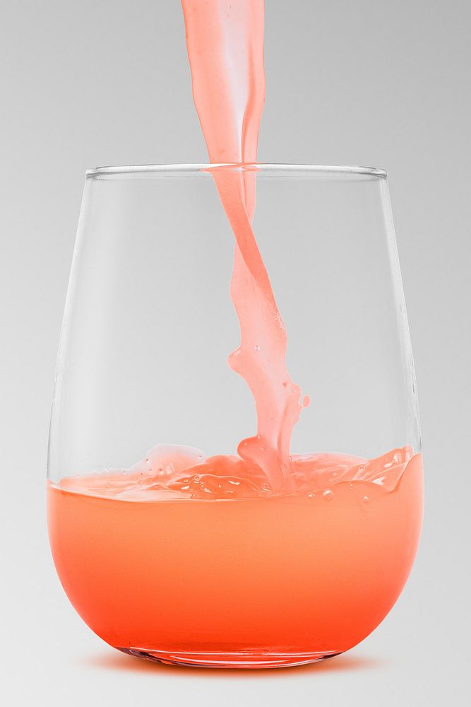 Juicy fruit punch poured into a glass design resource