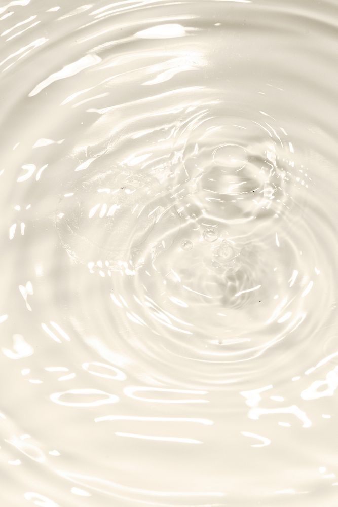 Water drop on clear water wave circle pattern background