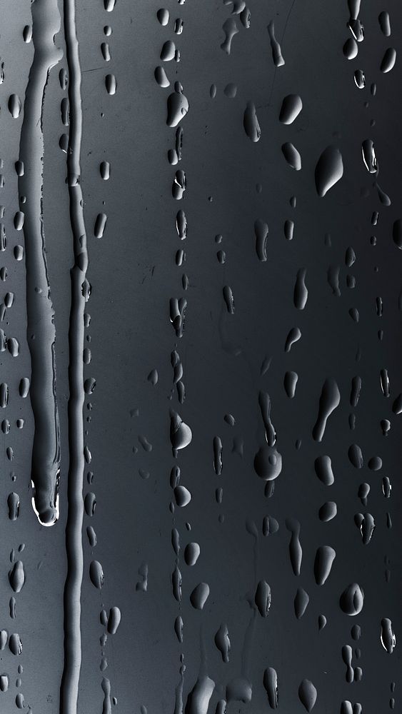 Rain drops on glass textured background 