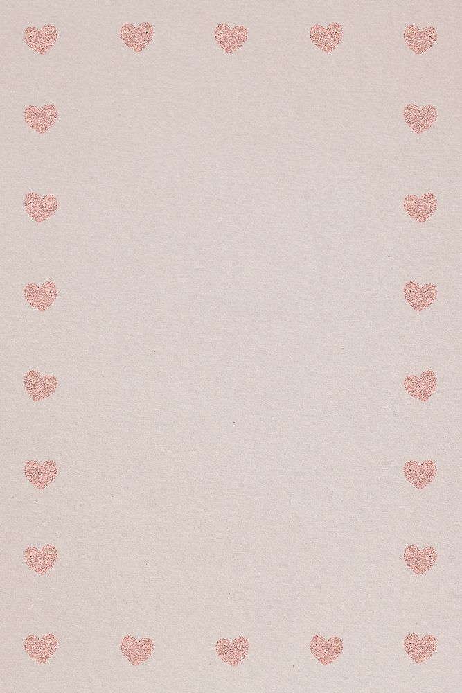 Pink heart patterned frame on a light brown background