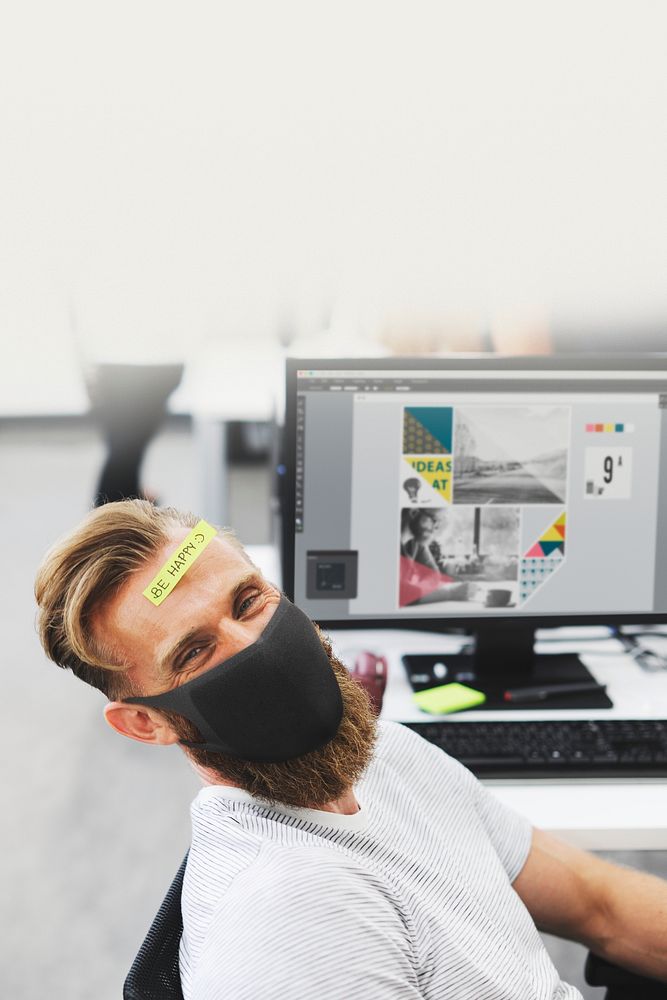 Office in new normal, man wearing medical mask