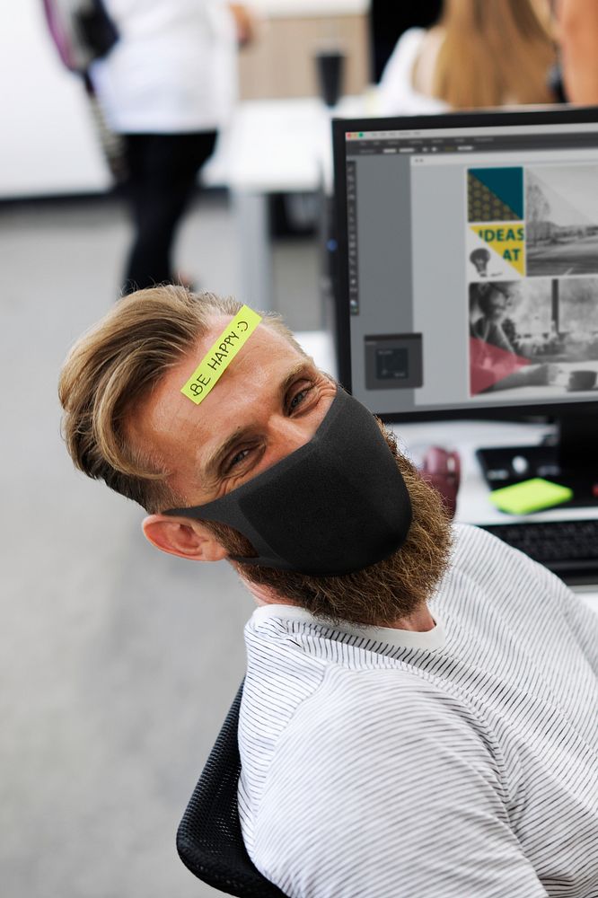 Covid 19, employee in new normal wearing mask