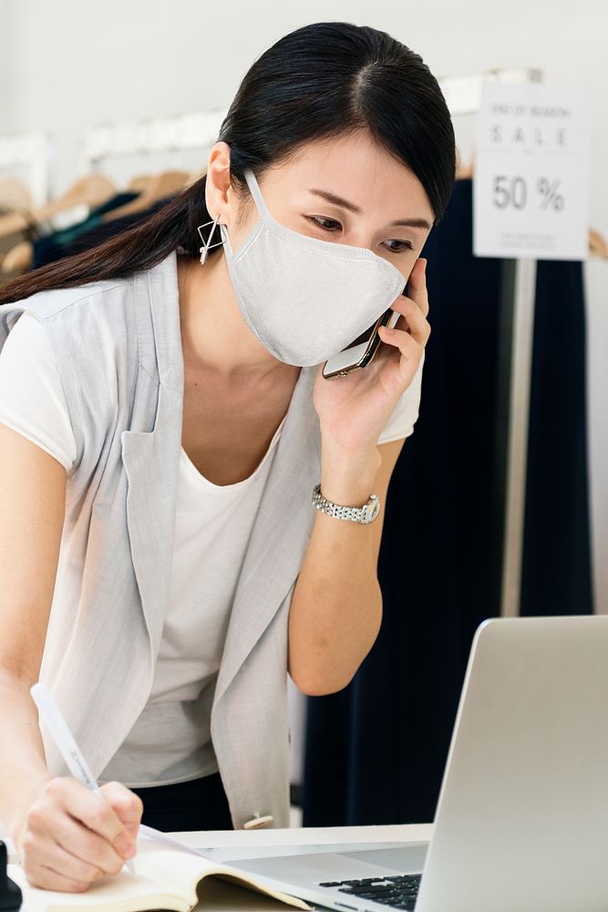 Business owner in face mask, the new normal
