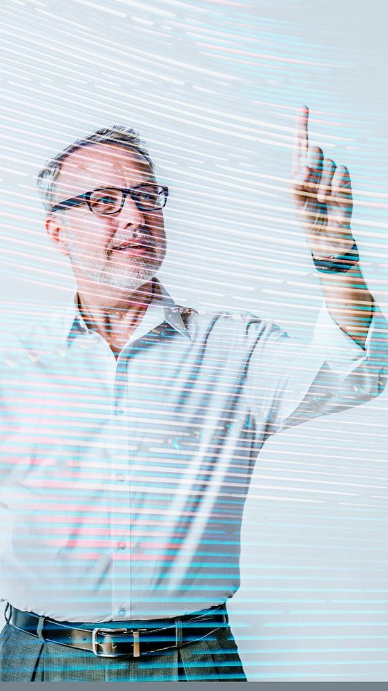 Senior businessman pointing on invisible screen