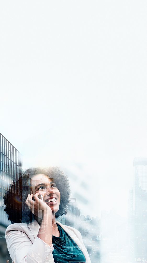 Young business woman on phone over city background