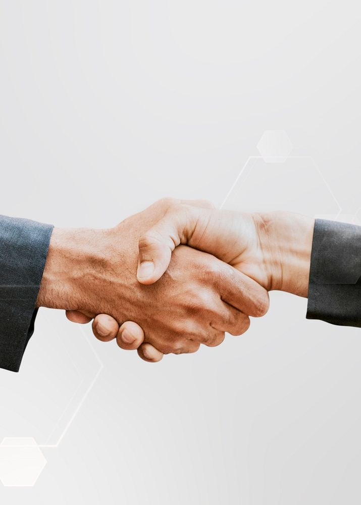 Business partners handshake technology deal