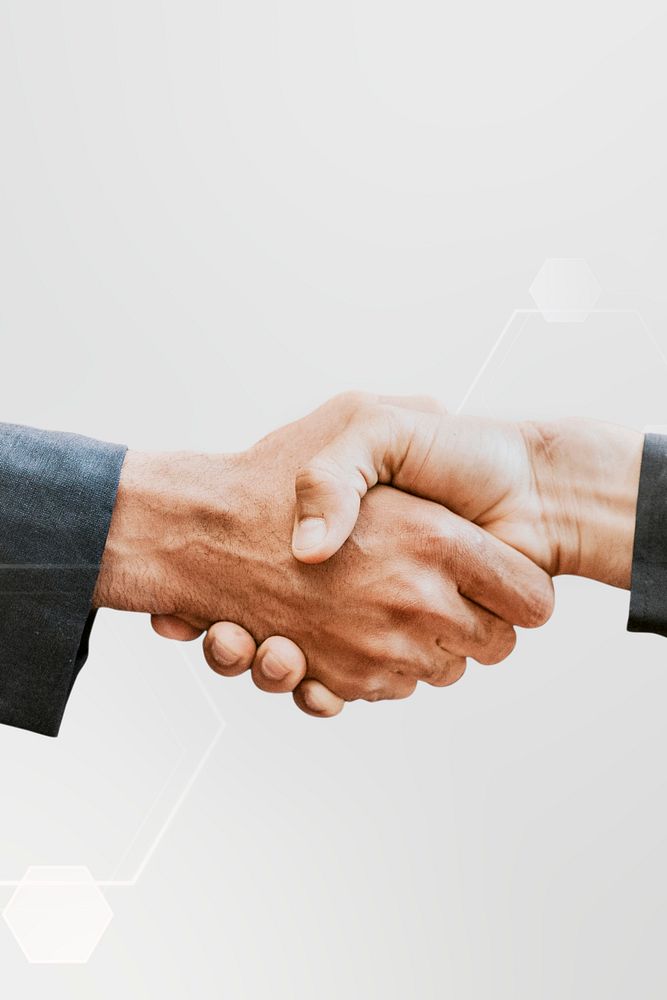 Business partners handshake technology deal
