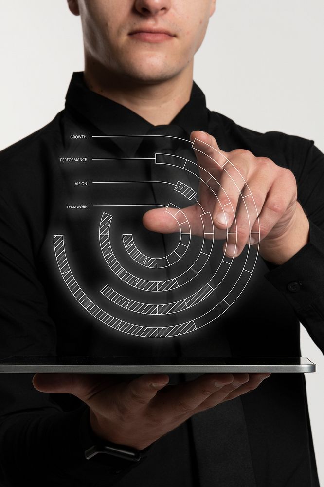 Futuristic digital circle graph presentation by a businessman in black shirt