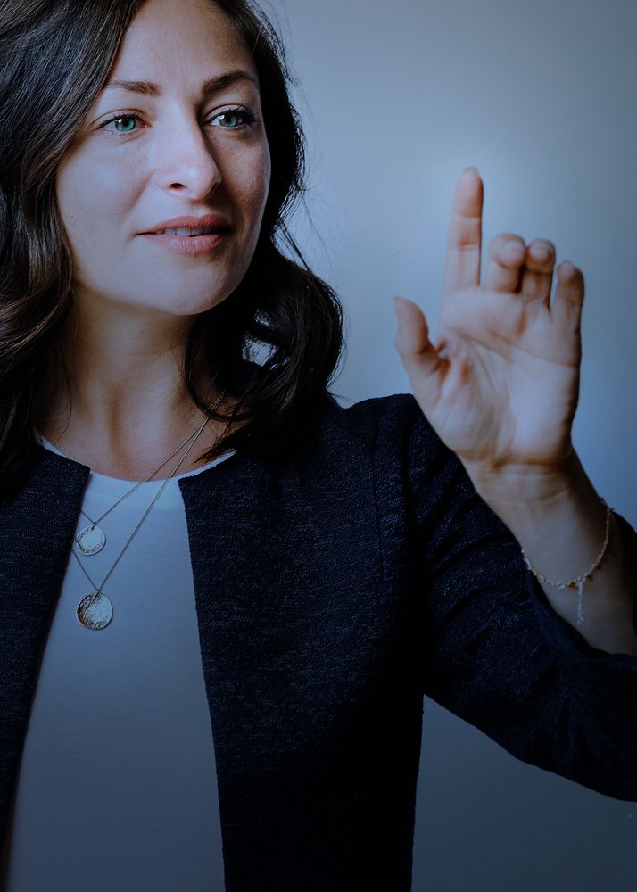 Senior businesswoman pointing on invisible digital screen