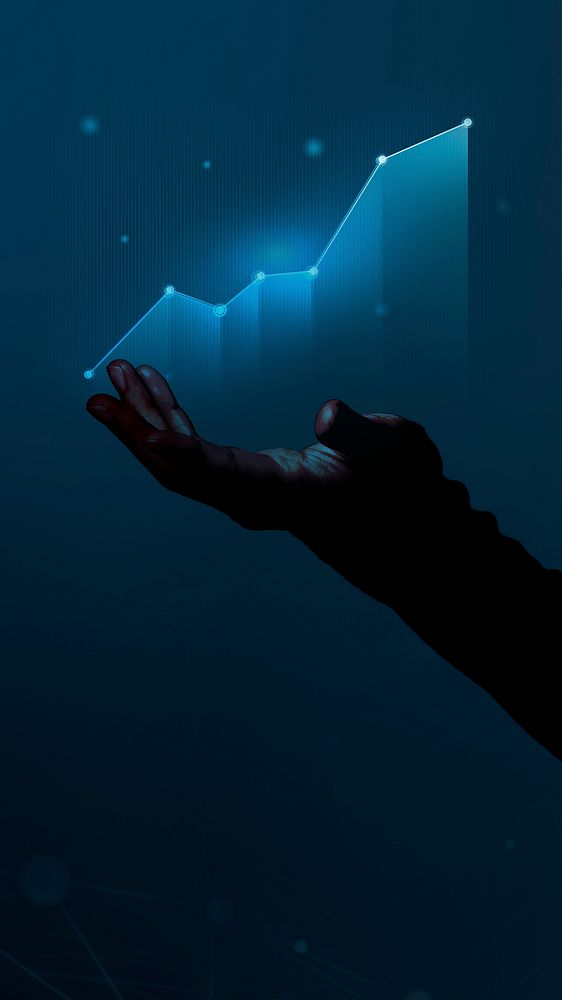 Business person holding a digitally generated upward graph
