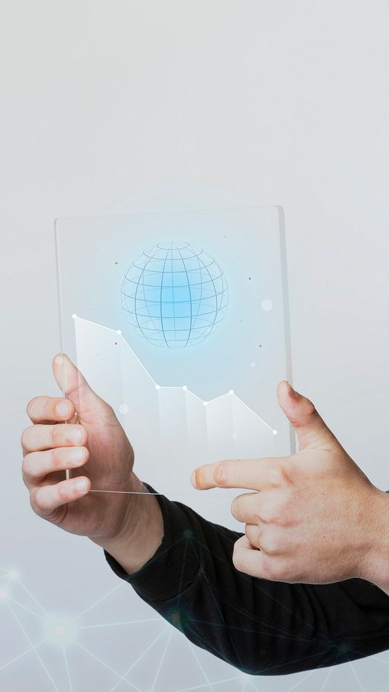 Businessman holding a digital screen that shows globe