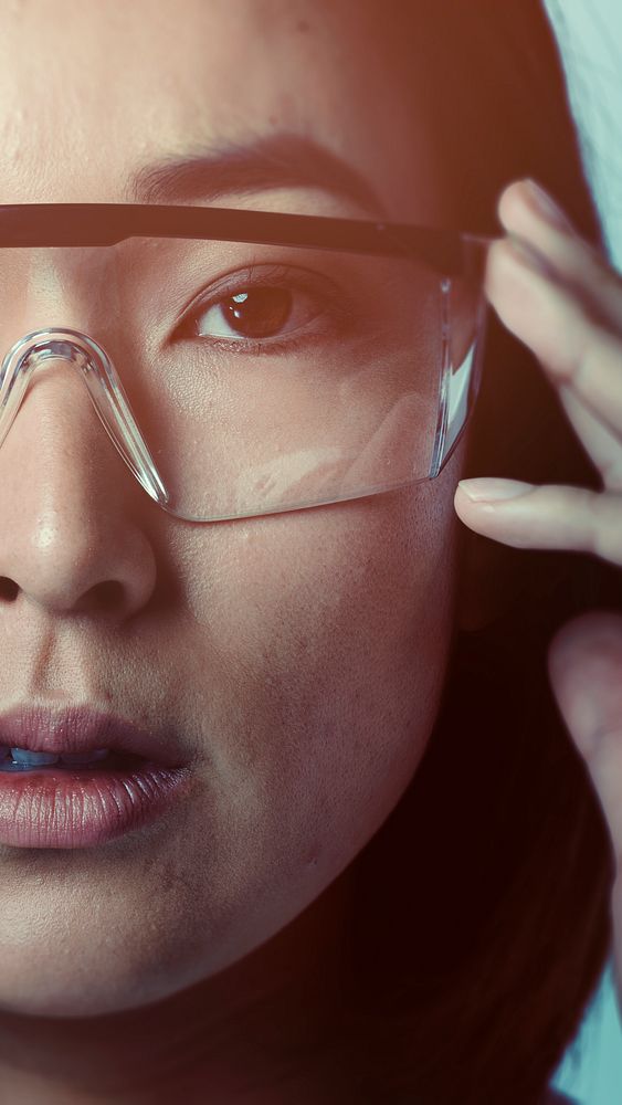 Businesswoman wearing AR glasses/AR smart glasses/smart glasses  futuristic technology