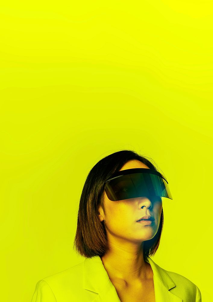 Woman showing squared transparent tablet yellow screen