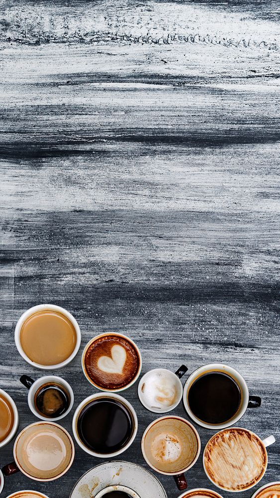 Various coffee mugs on an abstract textured wallpaper