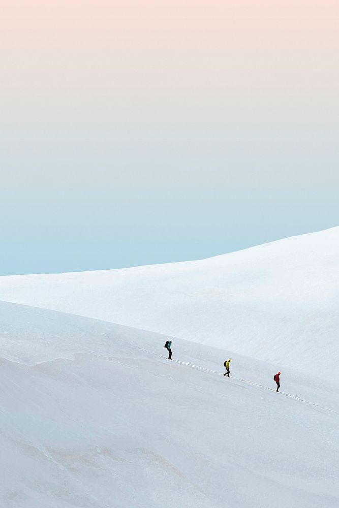 Creative background of minimal snow-covered mountain with people hiking