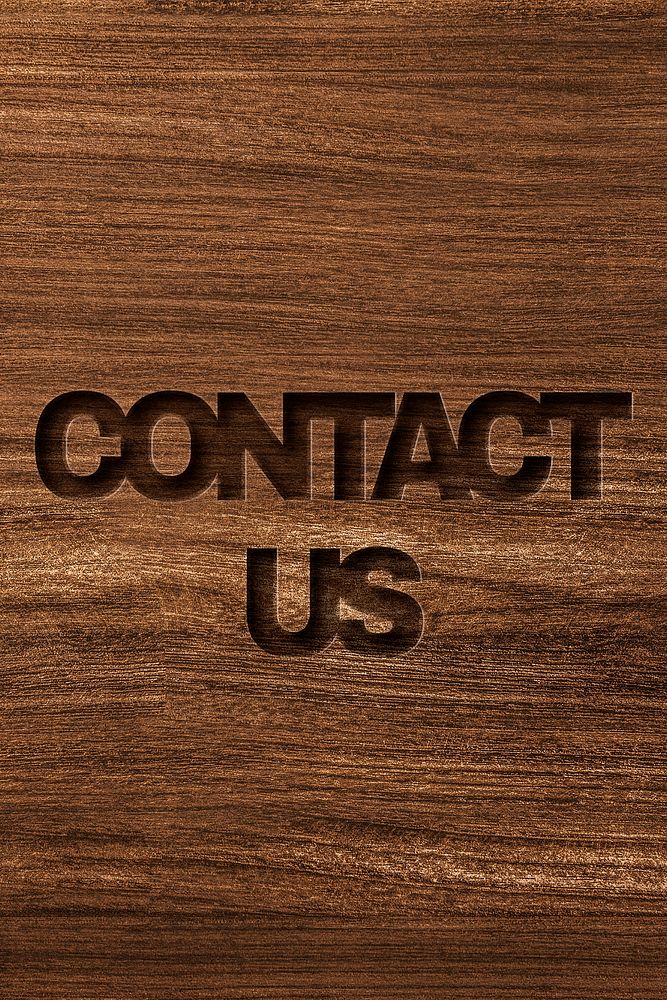 Contact us engraved wood typography on wooden background